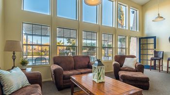 Somerpointe clubhouse with cozy lounge area and wonderful glass windows